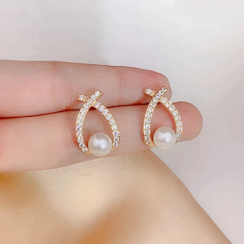 Aretes de perlas y lentejuelas