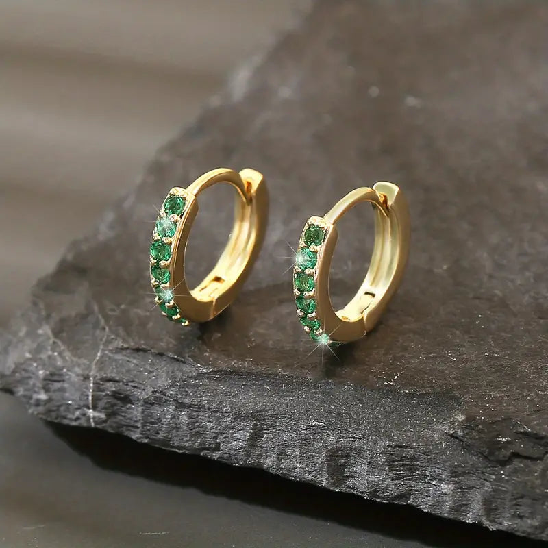 Aretes de oro con piedras delicadas