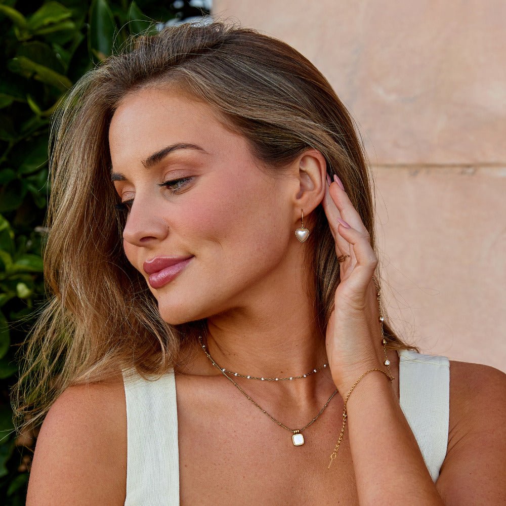 Aretes criollos de corazón con perla