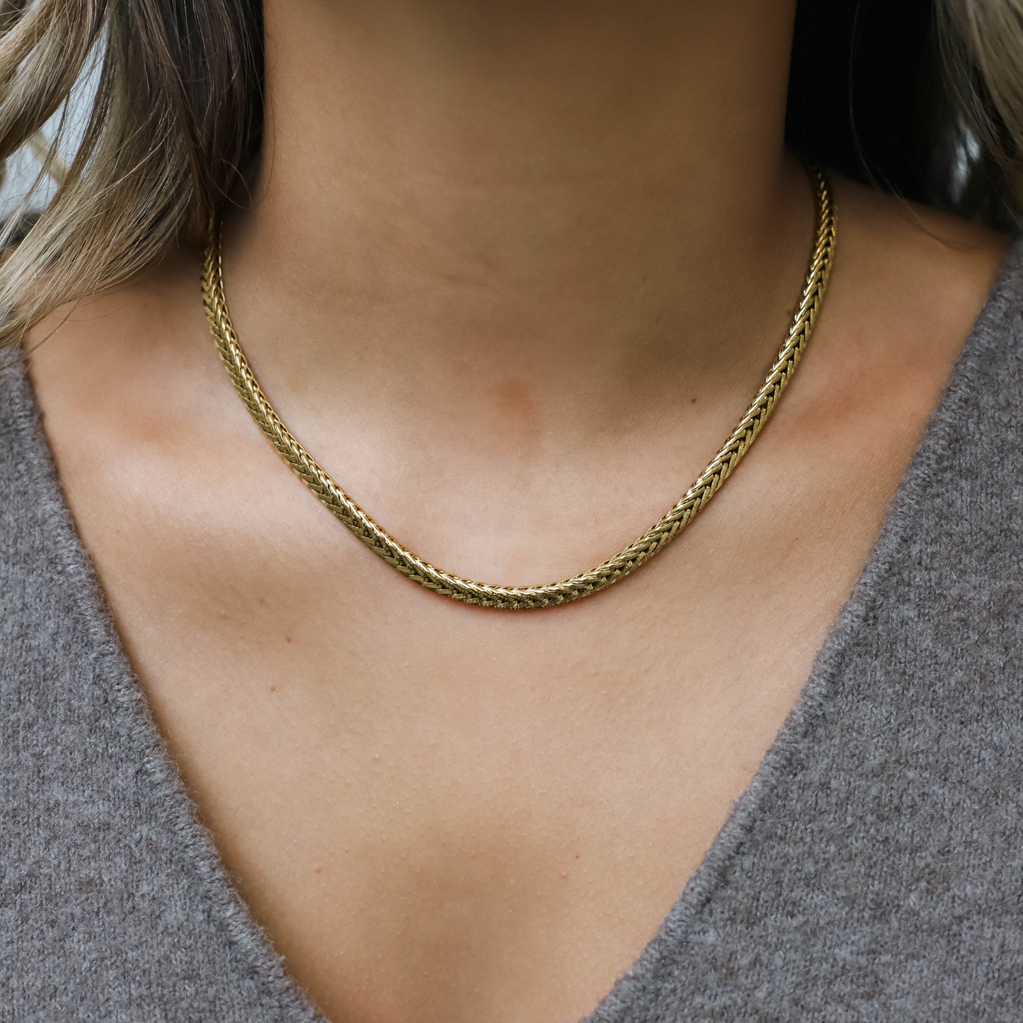 INTRECCIO. Collar
