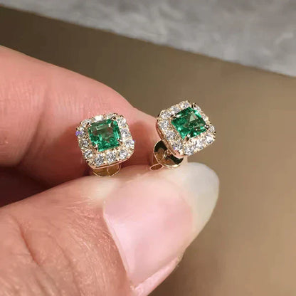 Aretes de esmeraldas con detalles en oro