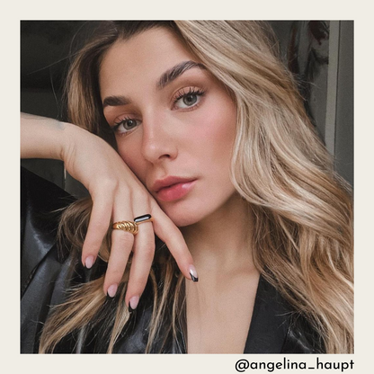 Anillo concha negro chapado en oro