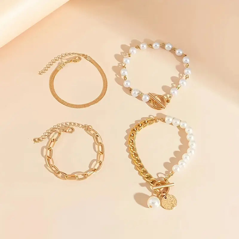 Elegante set de pulseras doradas (4 piezas) – serpiente, perlas y eslabones