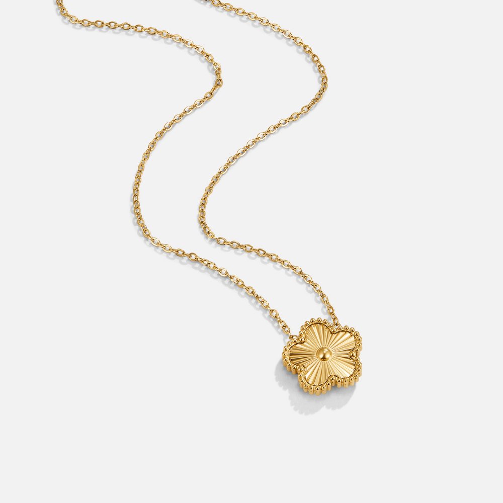 Collar de trébol dorado