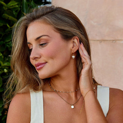 Aretes criollos de corazón con perla
